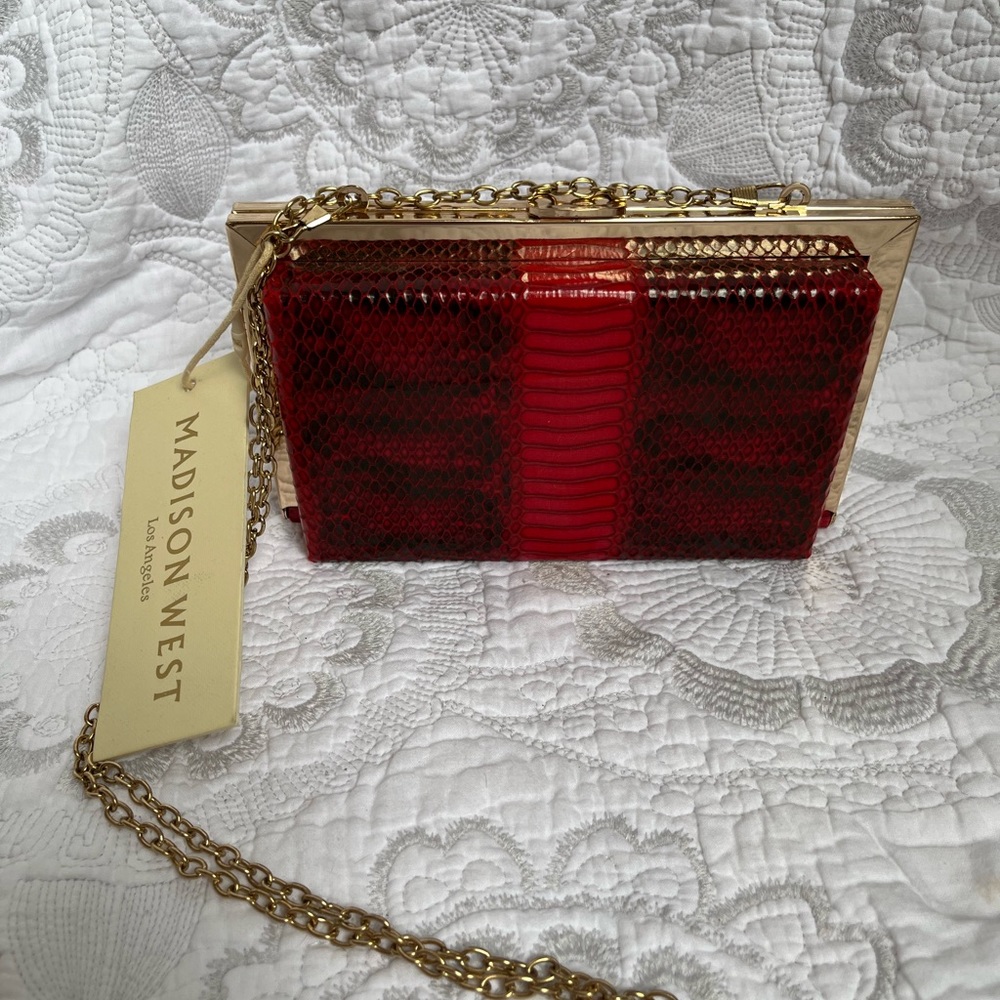 MADISON WEST red clutch